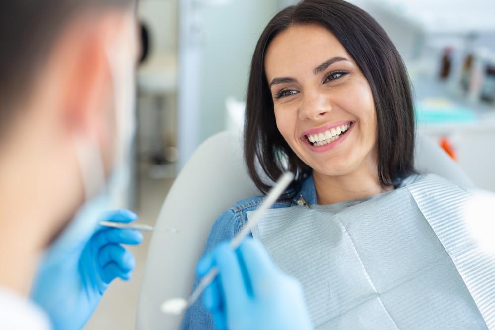 A woman smiling after being informed she will be sedated in Van Nuys, CA