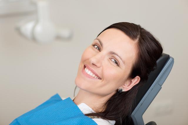 Woman in treatment chair at our restorative dentist in Van Nuys, CA