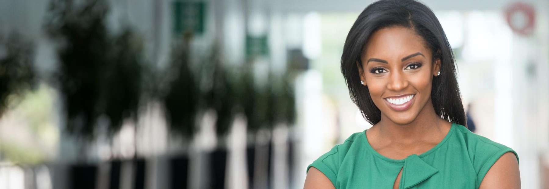 A lady after visiting The Dental Care Center for teeth whitening