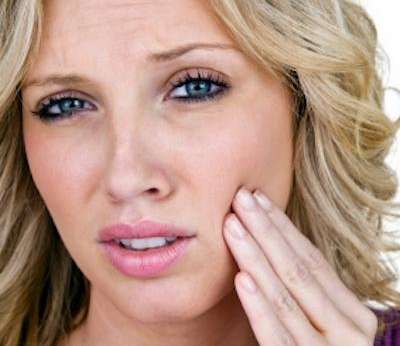 A woman with a tooth ache in Van nuys