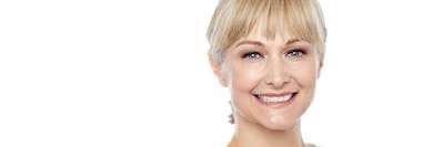 A lady smiling after teeth whitening in Van Nuys, CA