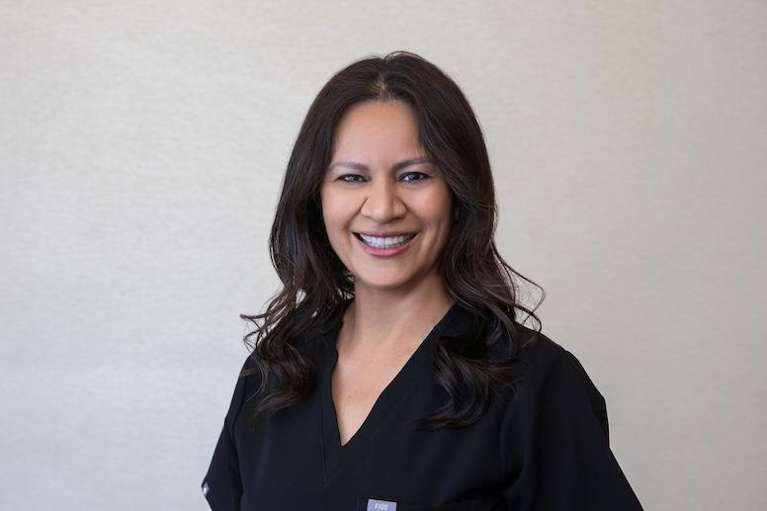 Gabriela Martinez, Office Manager at The Dental Care Center in Van Nuys