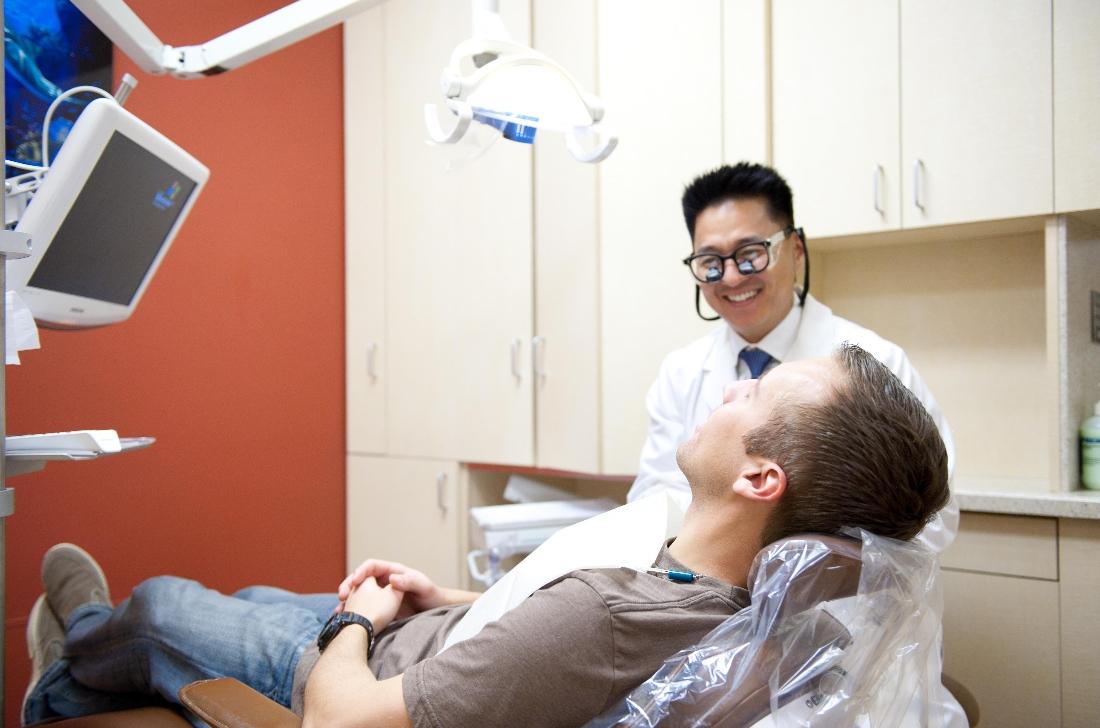 Dr. Peter Suh during a dental exam in Van Nuys, CA